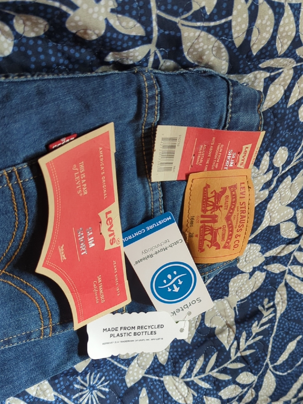 Levi's Blue Denim Jeans with Red Tags and Tan Patch